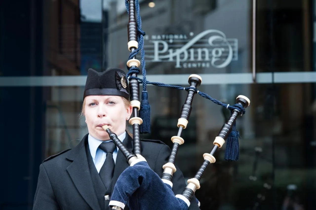 Piper playing the bagpipes